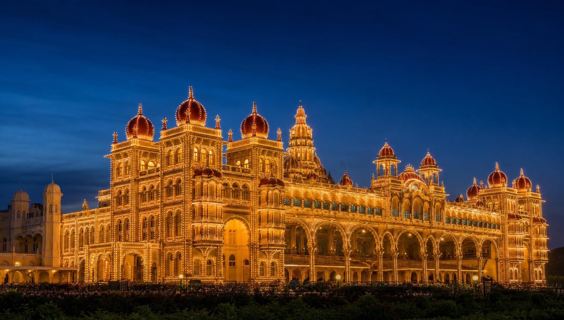 Mysore Palace illuminated at dusk
